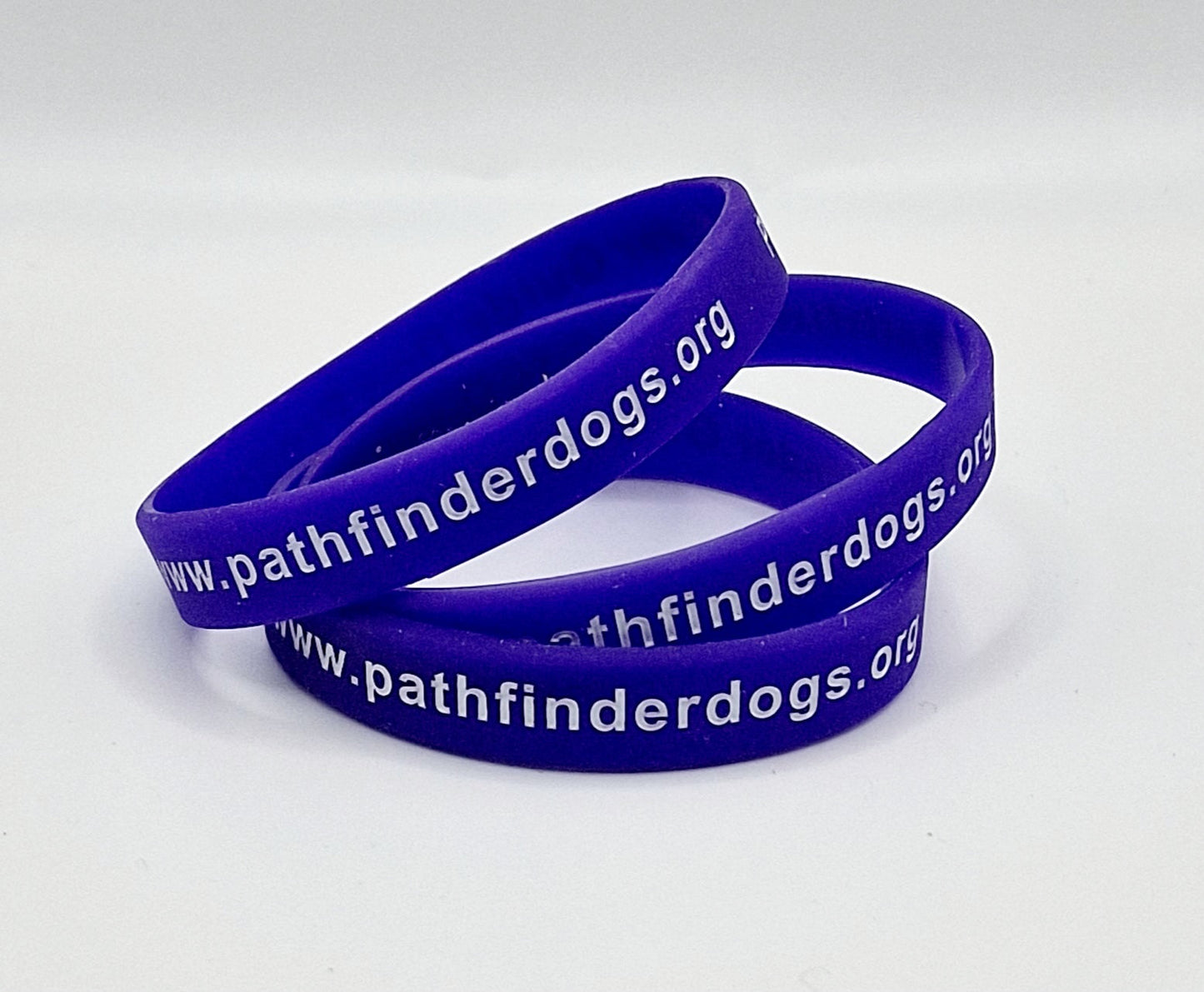 Wristbands showing pathfinder dogs website address