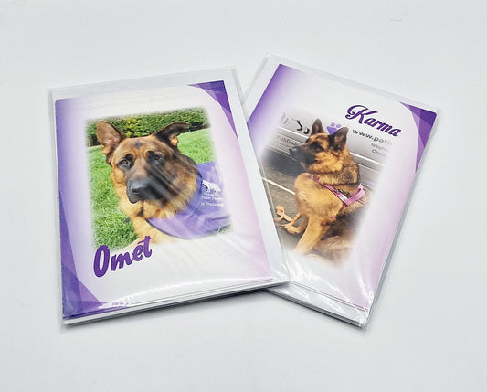 Notelet cards showing Pathfinder Dogs Omet and Karma