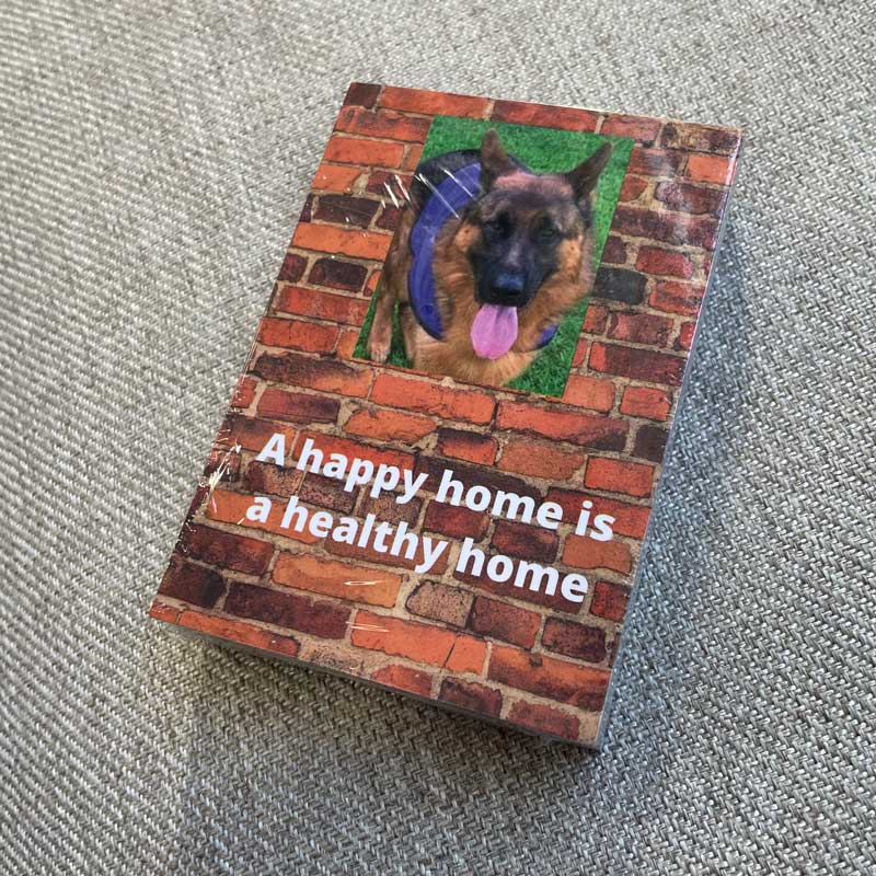 Card showing quote "a happy home a healthy home " and a picture of Omet 